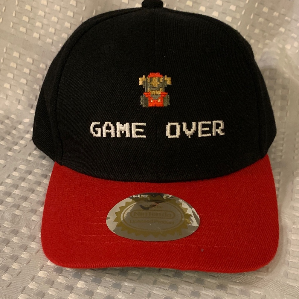 Nintendo red and black cap, with Mario and GAME OVER embroidered on the front.